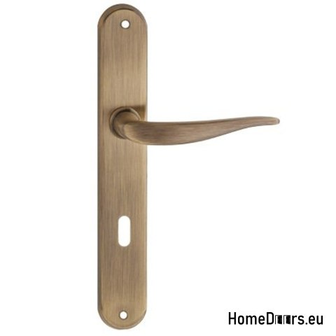 Klamka drzwiowa Monica długi szyld 72 mm standard Klamka drzwiowa Monica długi szyld 72 mm standard